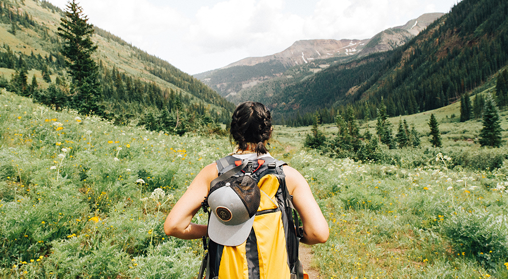 Person hiking in mountains